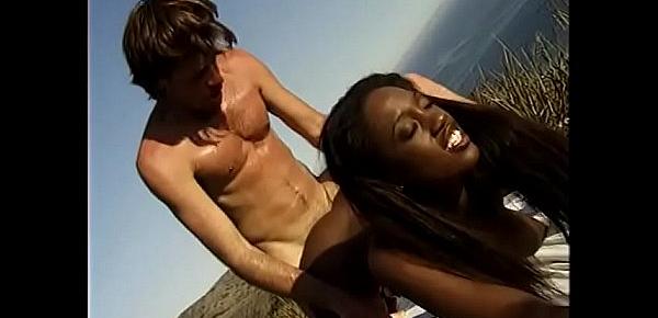  Dirty interracial couple enjoys outdoor sex near the warm sea